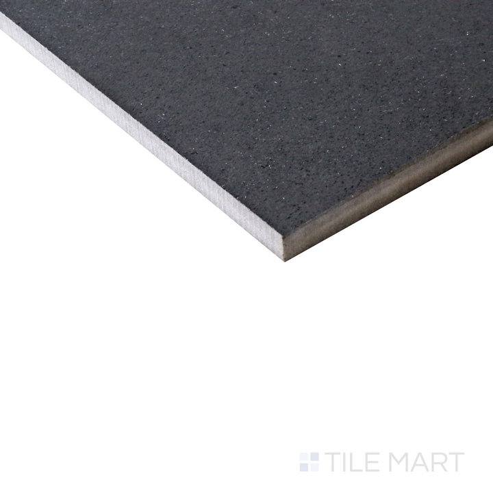 Angled shot of Urban Living Metropolis 12x24 matte porcelain tile, showcasing its contemporary gray tones, smooth matte finish, and structured rectangular design.  