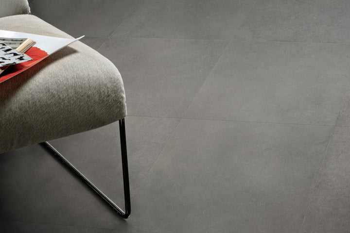 A contemporary urban space featuring Urban Living Metropolis 12X24 Matte Porcelain, blending industrial-inspired textures with a sleek matte finish.