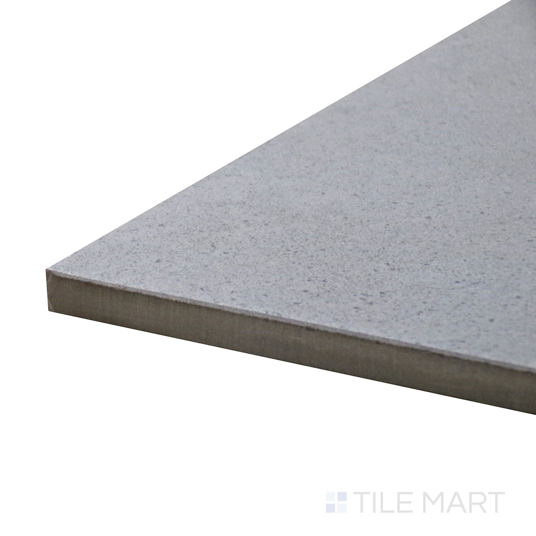 Side perspective of Urban Living Mist Grey 12X24 Matte Porcelain Tile, capturing its cool gray undertones and subtle texture in a refined matte surface.