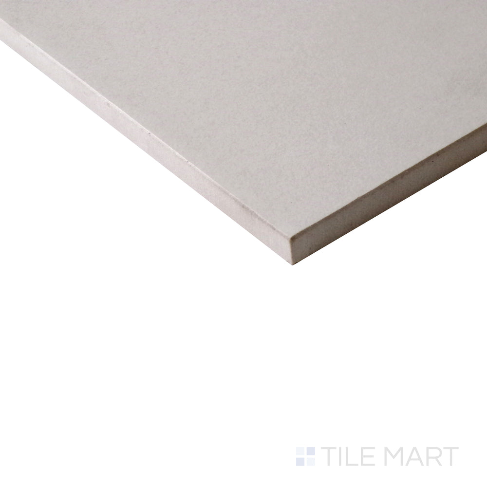 Angled shot of Urban Living Tan 12x24 matte porcelain tile, featuring warm tan hues, a natural matte finish, and a contemporary rectangular design.  