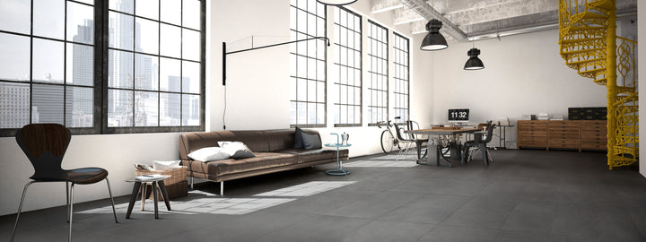 A stylish, modern interior featuring Urban Living Titanium 12X24 Matte Porcelain, exuding a sleek metallic-inspired aesthetic in a contemporary matte finish.