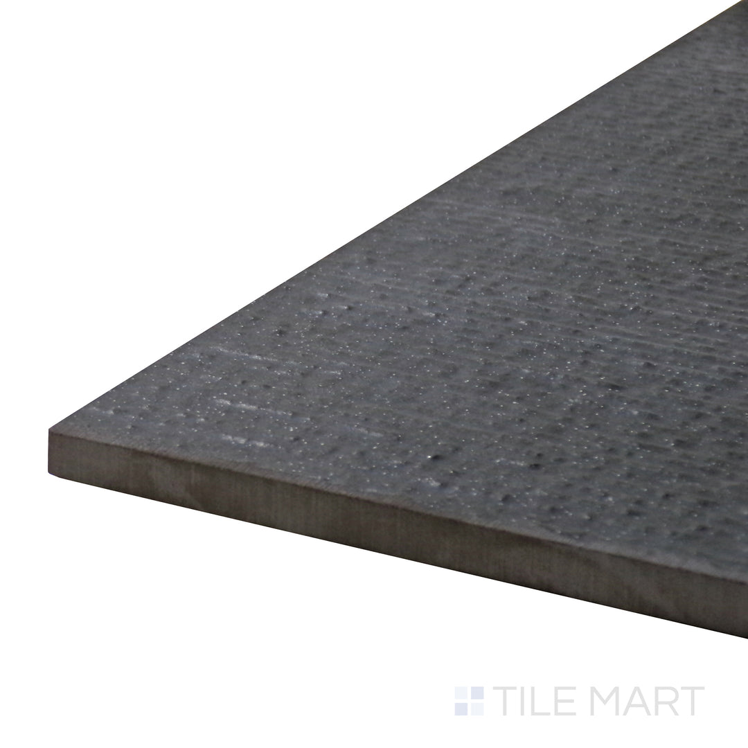 Angled view of Urban Living Metropolis 12X24 Chiseled Porcelain Tile, highlighting its bold gray hues and chiseled edges for a rugged appeal.