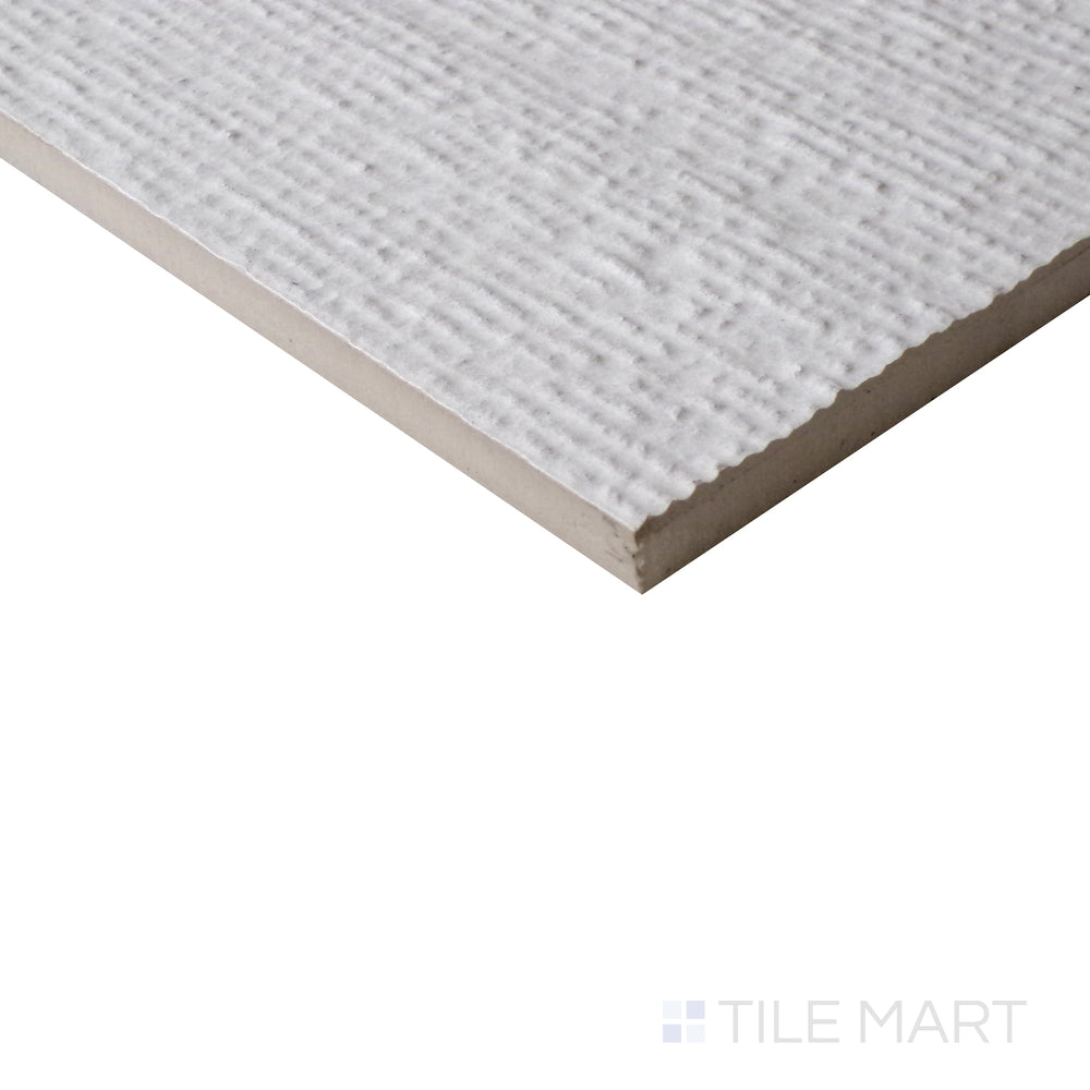 Angled view of Urban Living Pearl 12x24 chiseled porcelain tile, featuring soft pearl tones, natural stone-like texture, and detailed chiseled edges.  