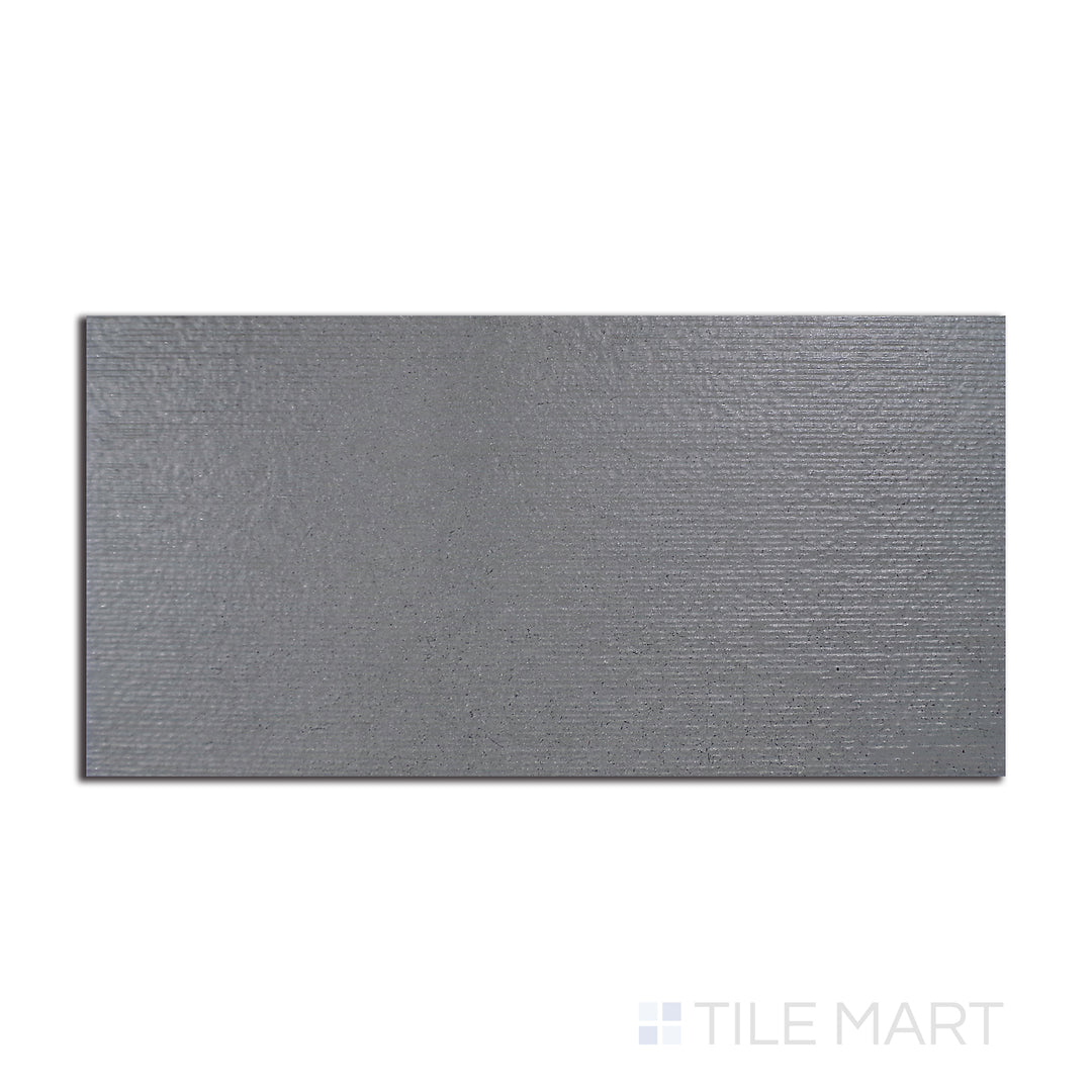 Flat-lay of Urban Living Titanium 12X24 Chiseled Porcelain, a contemporary titanium-hued tile with a rough-hewn chiseled edge for an industrial aesthetic.