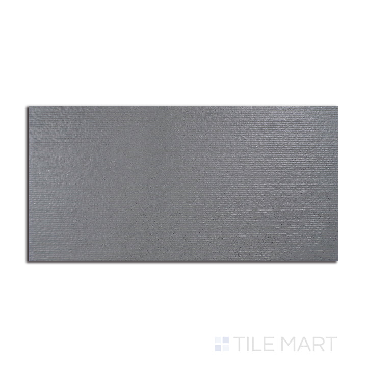 Flat-lay of Urban Living Titanium 12X24 Chiseled Porcelain, a contemporary titanium-hued tile with a rough-hewn chiseled edge for an industrial aesthetic.