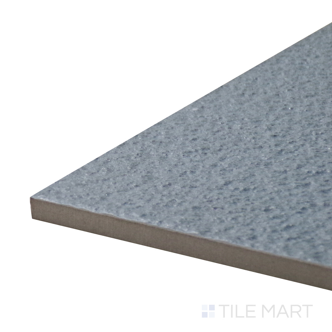 Corner-focused shot of Urban Living Coastal 12X24 Raw Porcelain Tile, highlighting its unrefined texture and natural stone aesthetic.