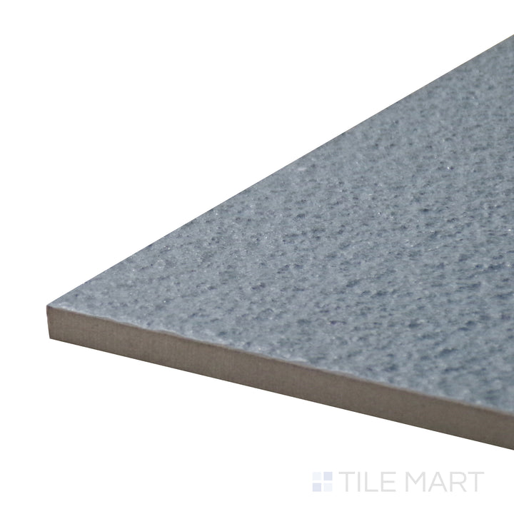 Corner-focused shot of Urban Living Coastal 12X24 Raw Porcelain Tile, highlighting its unrefined texture and natural stone aesthetic.