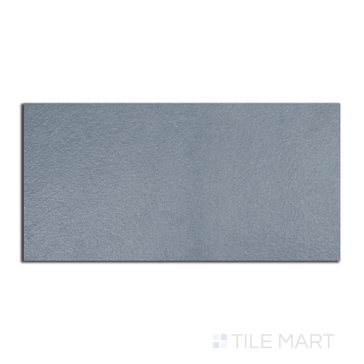 Flat-lay image of Urban Living Coastal 12X24 raw porcelain, highlighting an unfinished look that exudes an organic and natural ambiance.