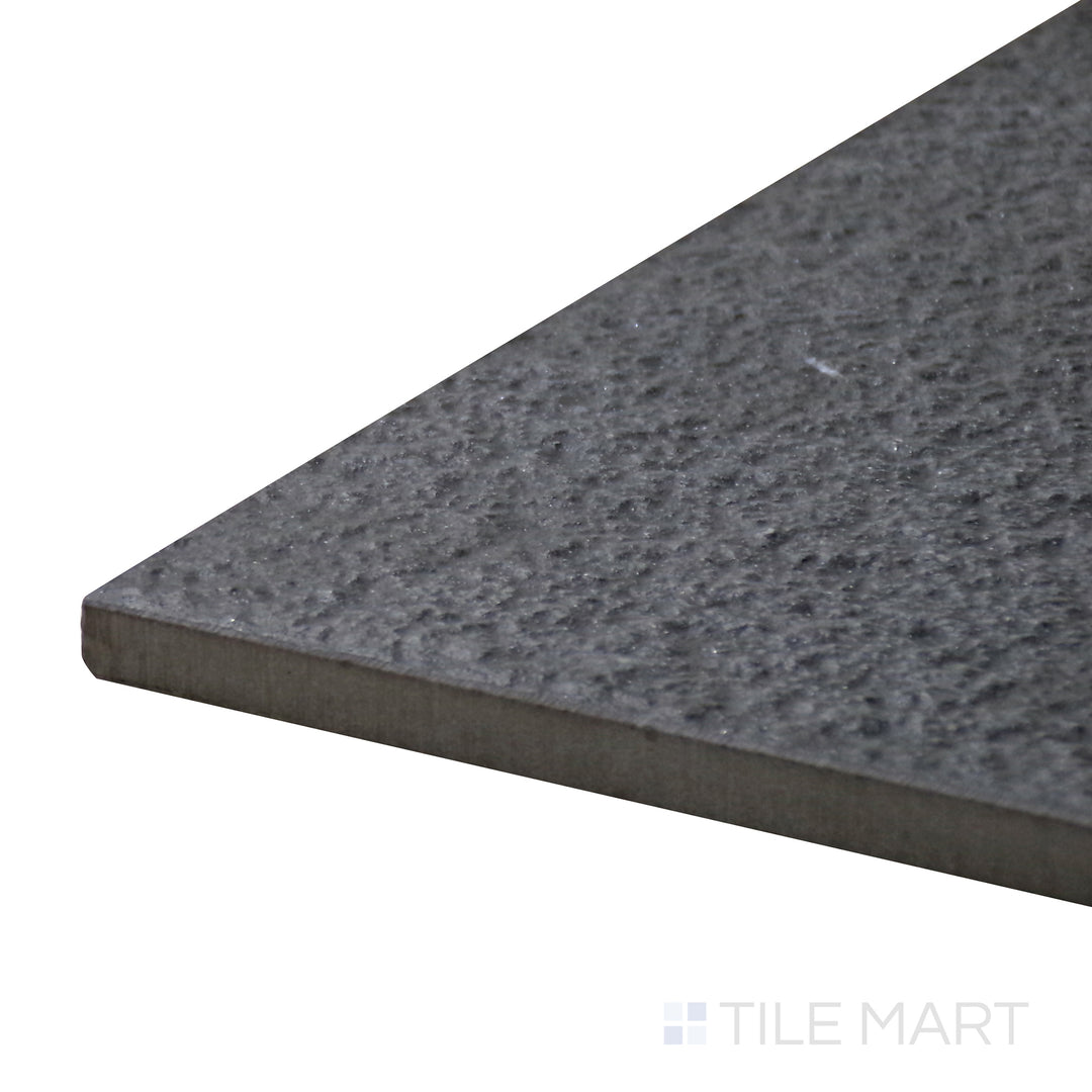 Close-up corner shot of Urban Living Metropolis 12X24 Raw Porcelain Tile, featuring its raw gray surface with a contemporary look.