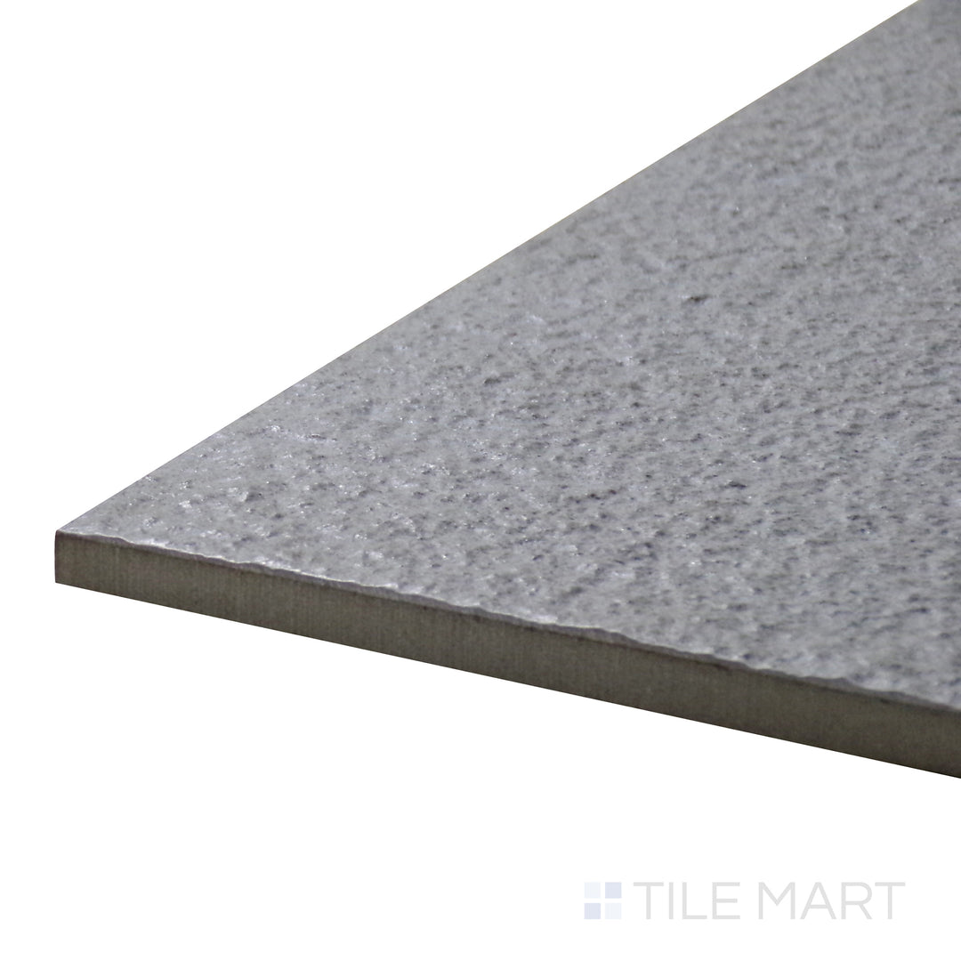 Corner angle of Urban Living Mist Grey 12X24 Raw Porcelain Tile, emphasizing its muted gray tones with a raw, unpolished texture.