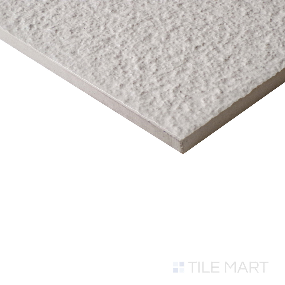 Diagonal shot of Urban Living Tan 12x24 raw porcelain tile, showcasing its warm tan tones, raw texture, and subtle natural variations.  