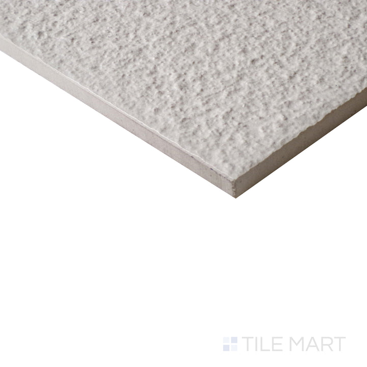 Diagonal shot of Urban Living Tan 12x24 raw porcelain tile, showcasing its warm tan tones, raw texture, and subtle natural variations.  