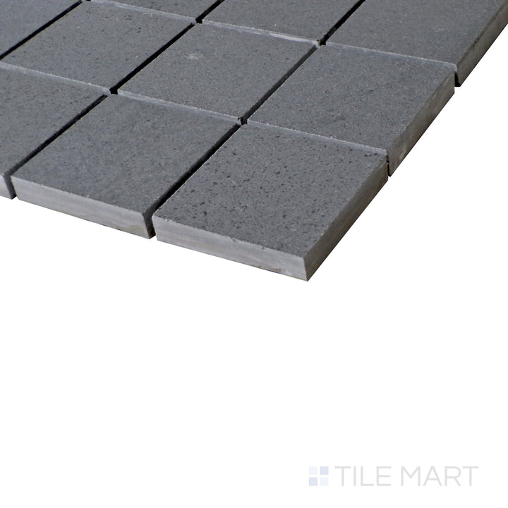 Slanted angle of Urban Living Titanium 2" Square matte porcelain mosaic, capturing its modern titanium gray hues, geometric square design, and contemporary matte texture.  