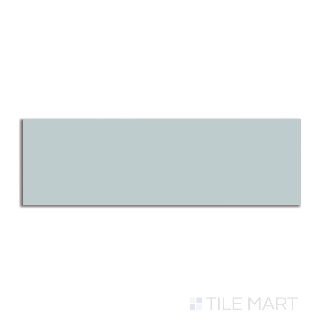 Top-down view of Village Cloud 2.5X8 glossy ceramic tile, a soft neutral gray shade with a polished look that adds a subtle sophistication.