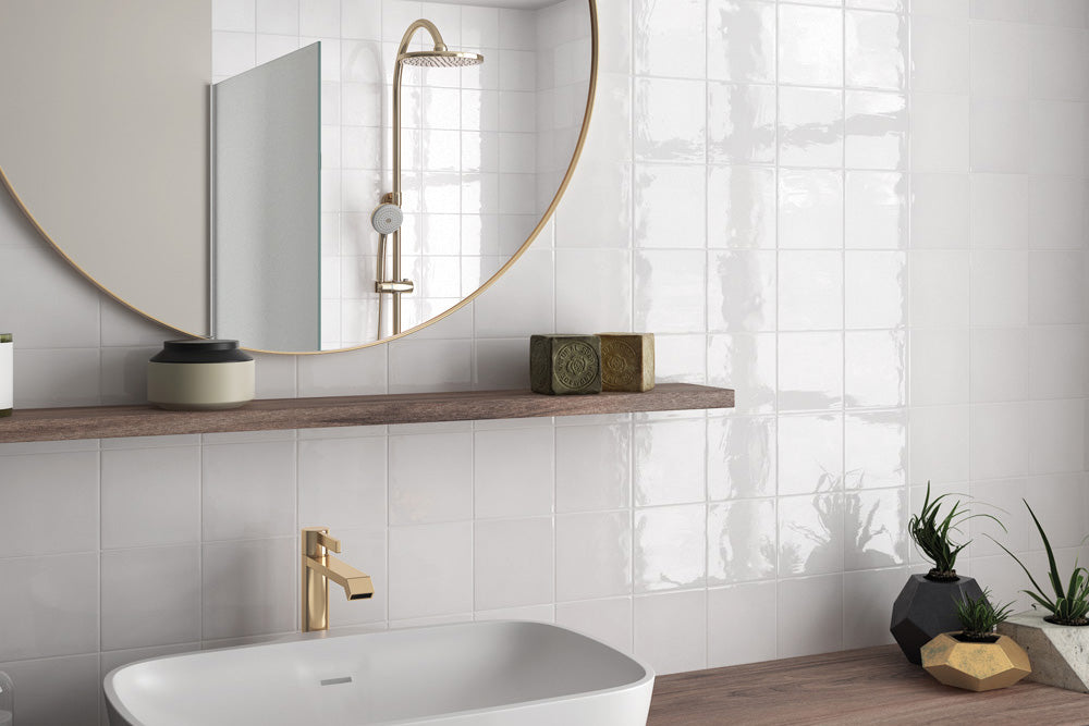 A timeless and airy space styled with Village White 5X5 Glossy Ceramic, bringing a clean and polished aesthetic to the design.