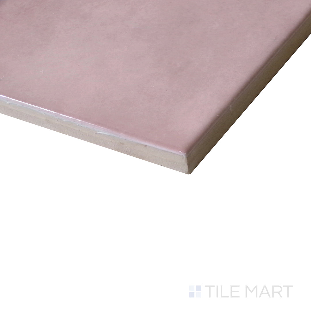 Diagonal view of Village Rose Gold 5x5 glossy ceramic tile, showcasing its warm rose gold tones, smooth glossy finish, and structured square format.  