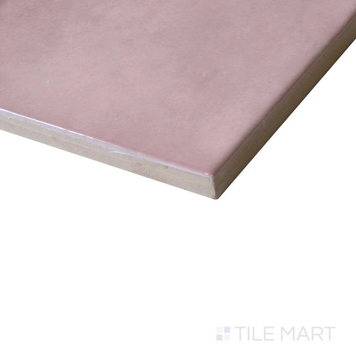 Diagonal view of Village Rose Gold 5x5 glossy ceramic tile, showcasing its warm rose gold tones, smooth glossy finish, and structured square format.  