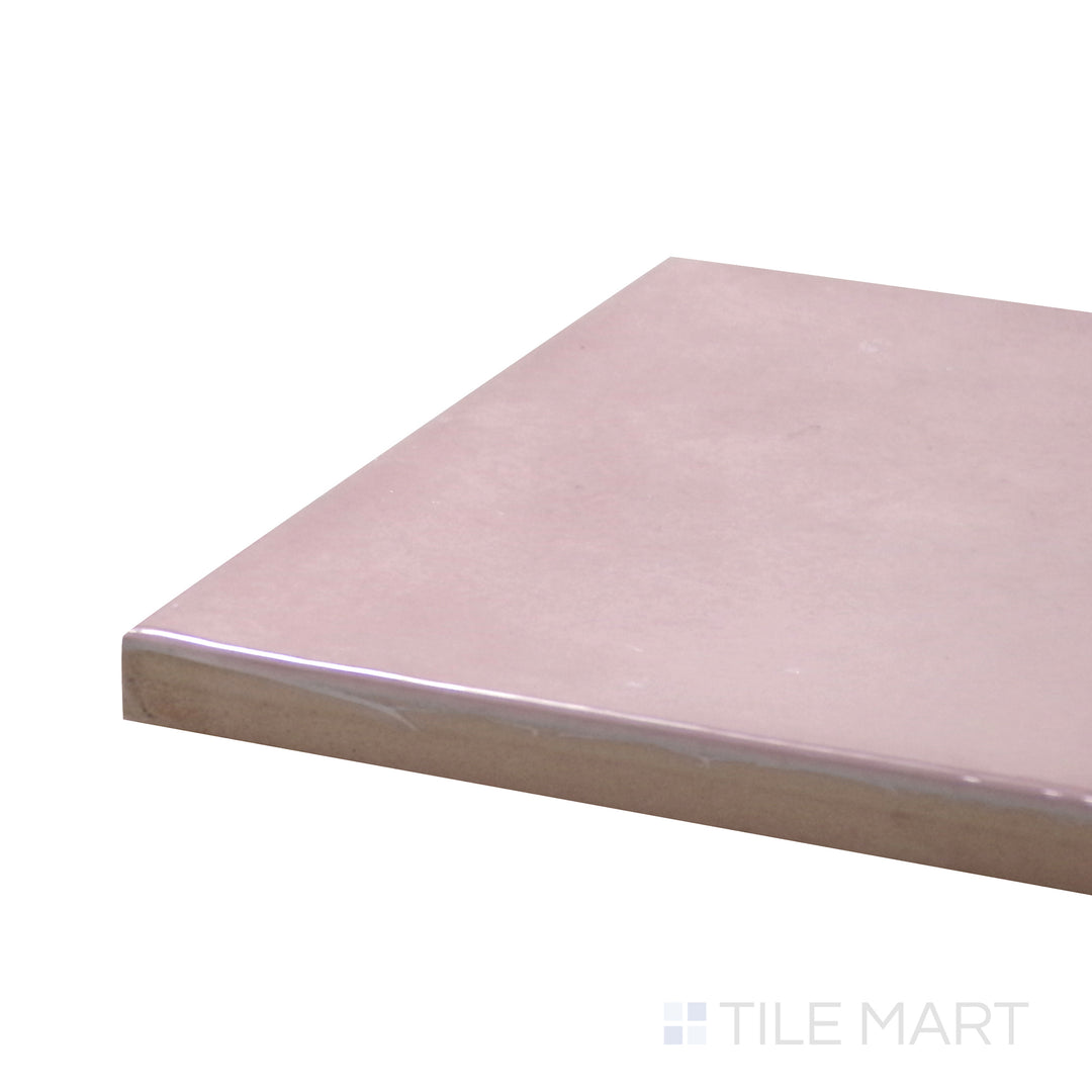 Side perspective of Village Rose Gold 5X5 Glossy Ceramic Tile, capturing its elegant pink-gold hue with a luminous, reflective texture.