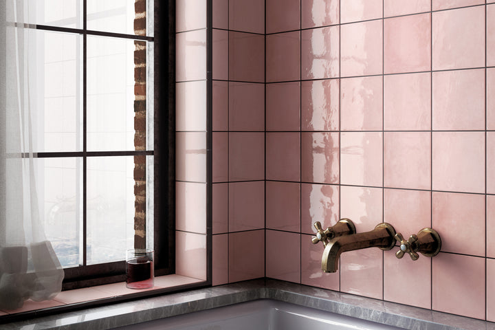 A refined and charming interior highlighted by Village Rose Gold 5X5 Glossy Ceramic, exuding soft pink-gold hues that add warmth and sophistication.