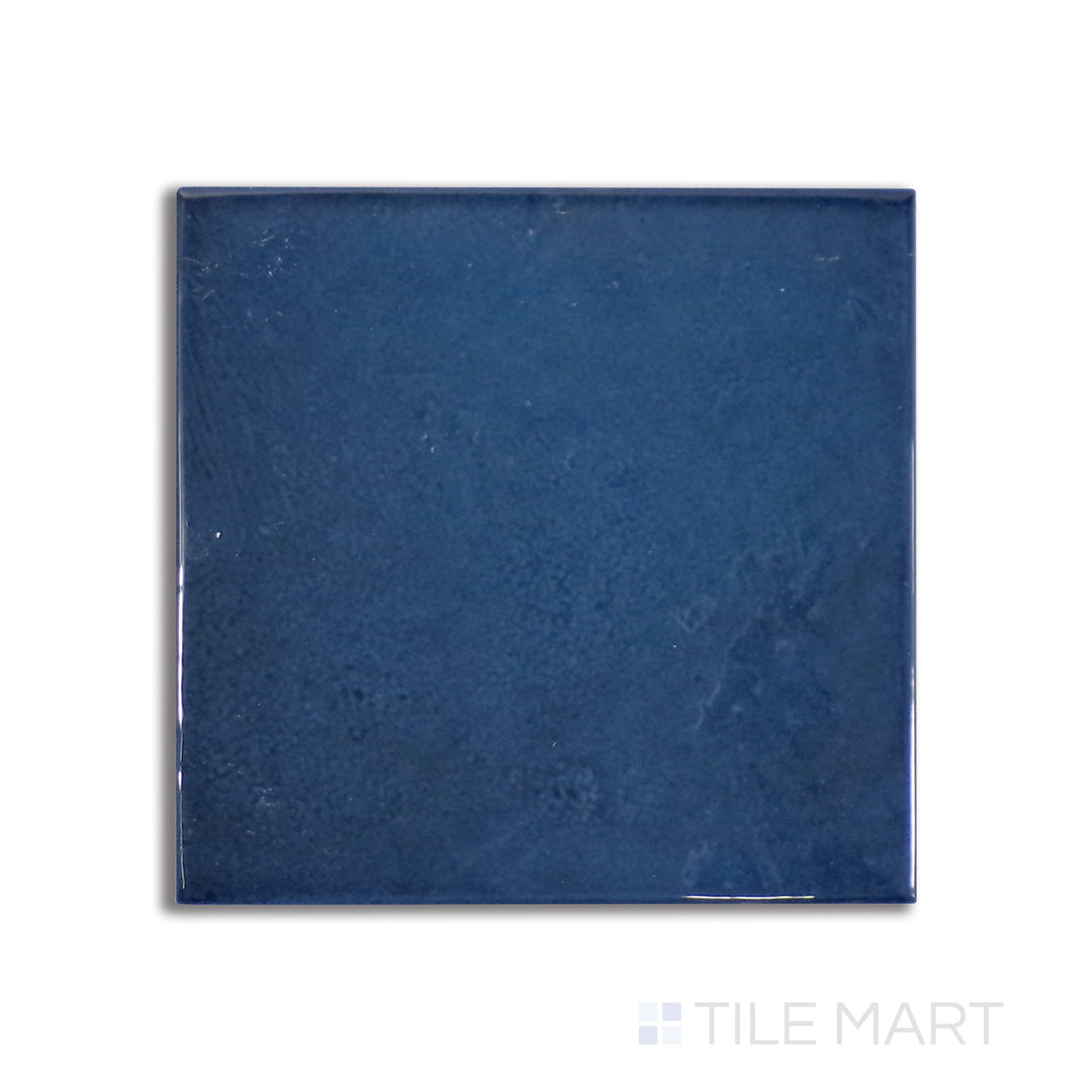 Top-down view of Village Royal Blue 5X5 glossy ceramic tile, a deep, regal blue ceramic piece with a striking polished surface.