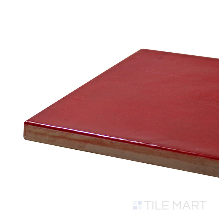 Corner angle of Village Volcanic Red 5X5 Glossy Ceramic Tile, emphasizing its fiery red color with a vibrant, glossy finish.