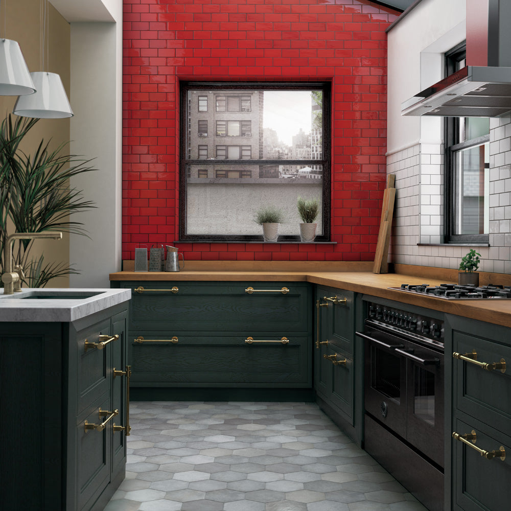 A fiery and dynamic statement made with Village Volcanic Red 5X5 Glossy Ceramic, introducing a bold red shade with a sleek and glossy finish.