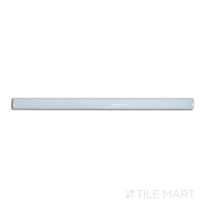 Flat-lay image of Village Cloud 0.5X8 glossy ceramic jolly, a soft gray trim piece with a polished finish for seamless tile transitions.