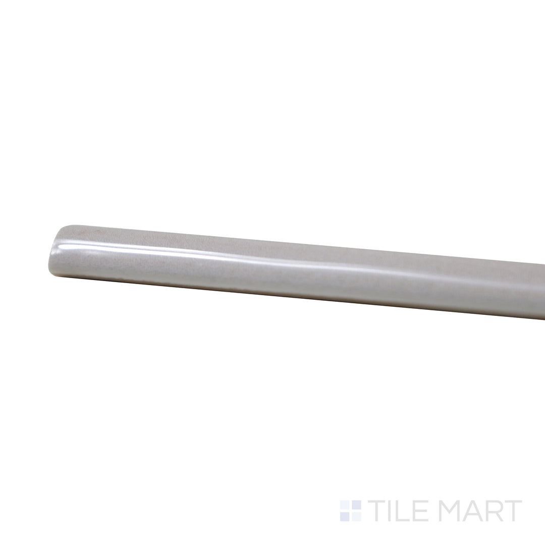 Close-up corner shot of Village Silver Mist 0.5X8 Glossy Ceramic Jolly, featuring its soft silver-gray shade with a glass-like finish.