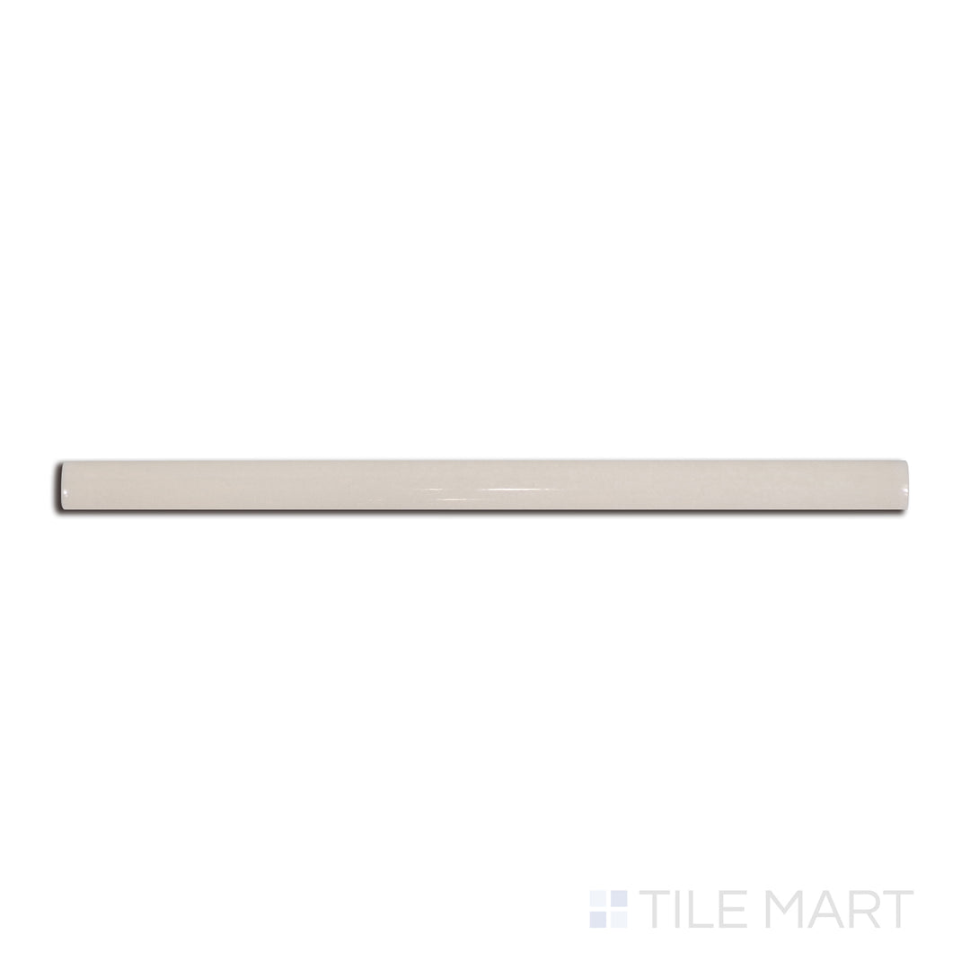 Top-down view of Village Silver Mist 0.5X8 glossy ceramic jolly, a cool gray trim tile with a lustrous surface, ideal for sophisticated designs.