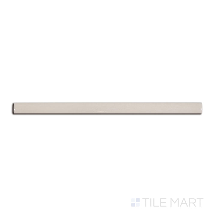 Top-down view of Village Silver Mist 0.5X8 glossy ceramic jolly, a cool gray trim tile with a lustrous surface, ideal for sophisticated designs.
