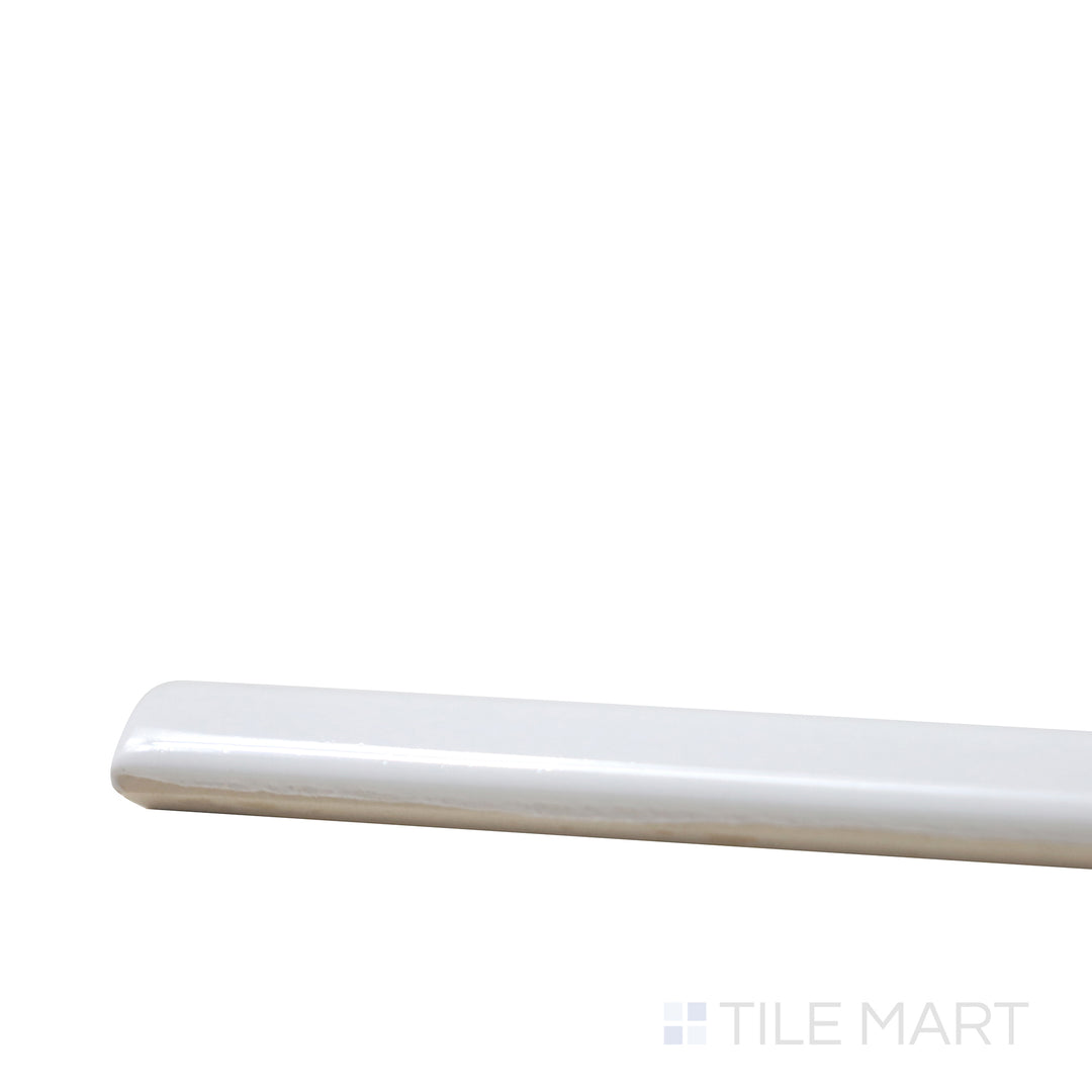 Angled view of Village White 0.5X8 Glossy Ceramic Jolly, showcasing its crisp white shade with a clean, polished edge.
