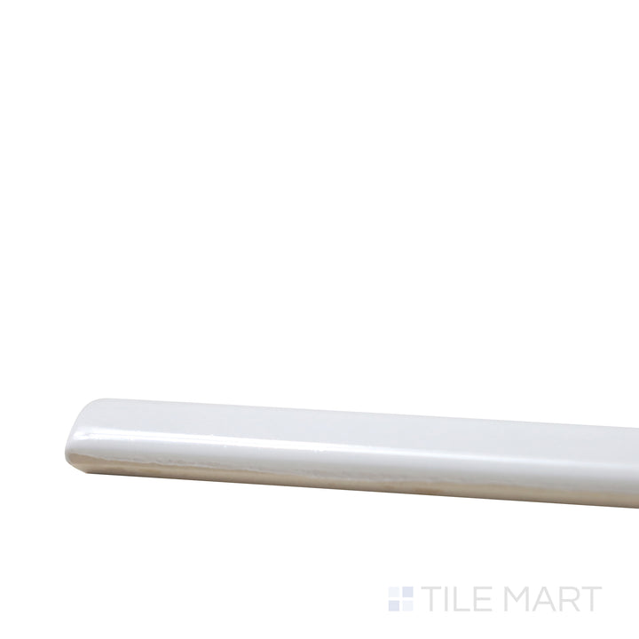 Angled view of Village White 0.5X8 Glossy Ceramic Jolly, showcasing its crisp white shade with a clean, polished edge.