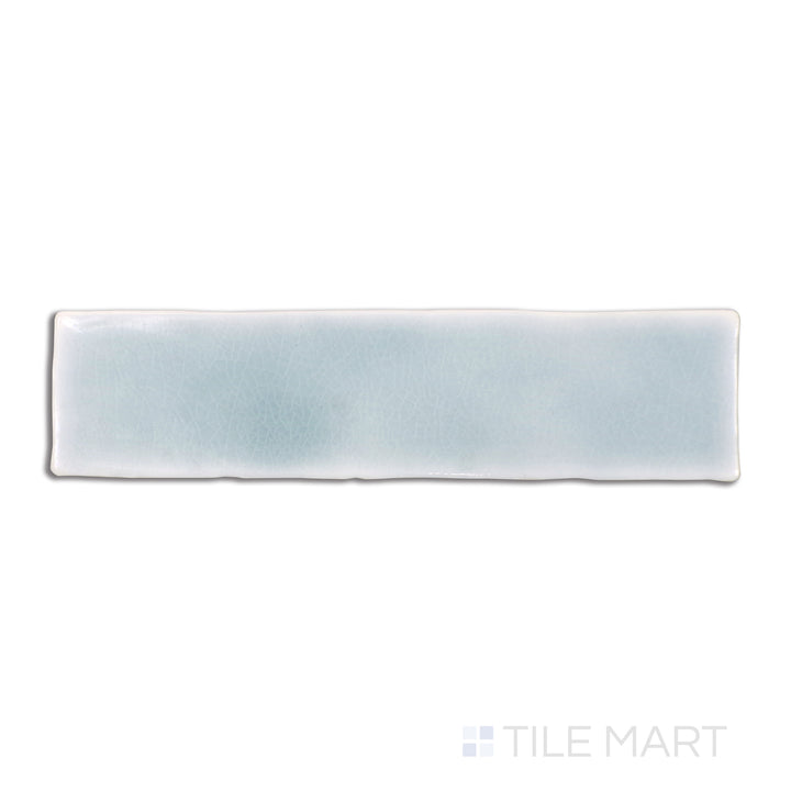 Top-down view of Vitral Aqua 3X12 glossy ceramic tile, featuring a vibrant aqua blue hue with a sleek, polished finish for a refreshing and modern aesthetic.