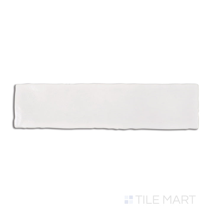 Overhead shot of Vitral Bianco 3X12 glossy ceramic tile, a classic white tile with a mirror-like gloss that enhances brightness and elegance in any space.