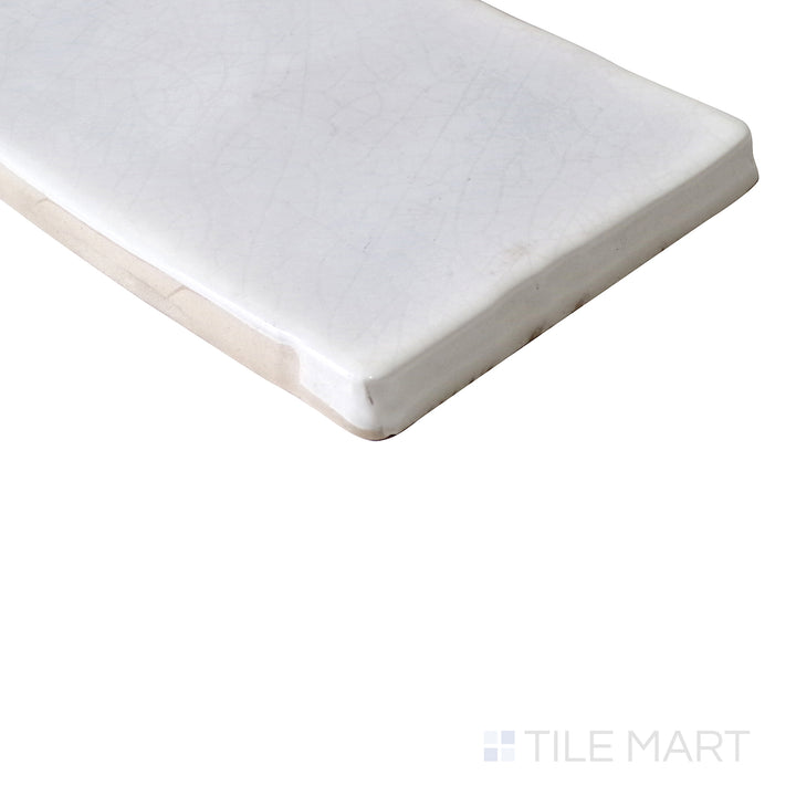 Slanted perspective of Vitral Lavanda 3x12 glossy ceramic tile, emphasizing its soft lavender tones, reflective glossy surface, and elongated shape.  