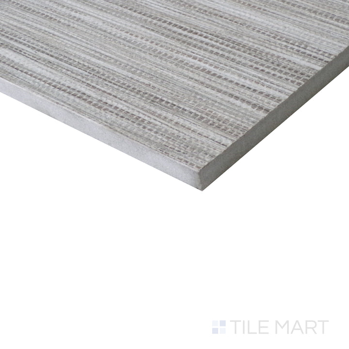 Diagonal view of Wooow Linen Biscuit 12x24 matte porcelain tile, showcasing warm biscuit hues, a subtle woven texture, and a modern matte surface.  