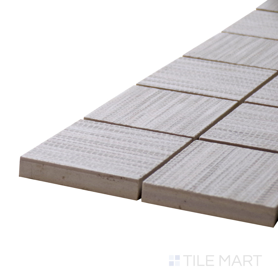 Corner angle of Wooow Linen Cotton 2" Square Matte Porcelain Mosaic, emphasizing its soft, neutral cotton hues in a structured square mosaic.