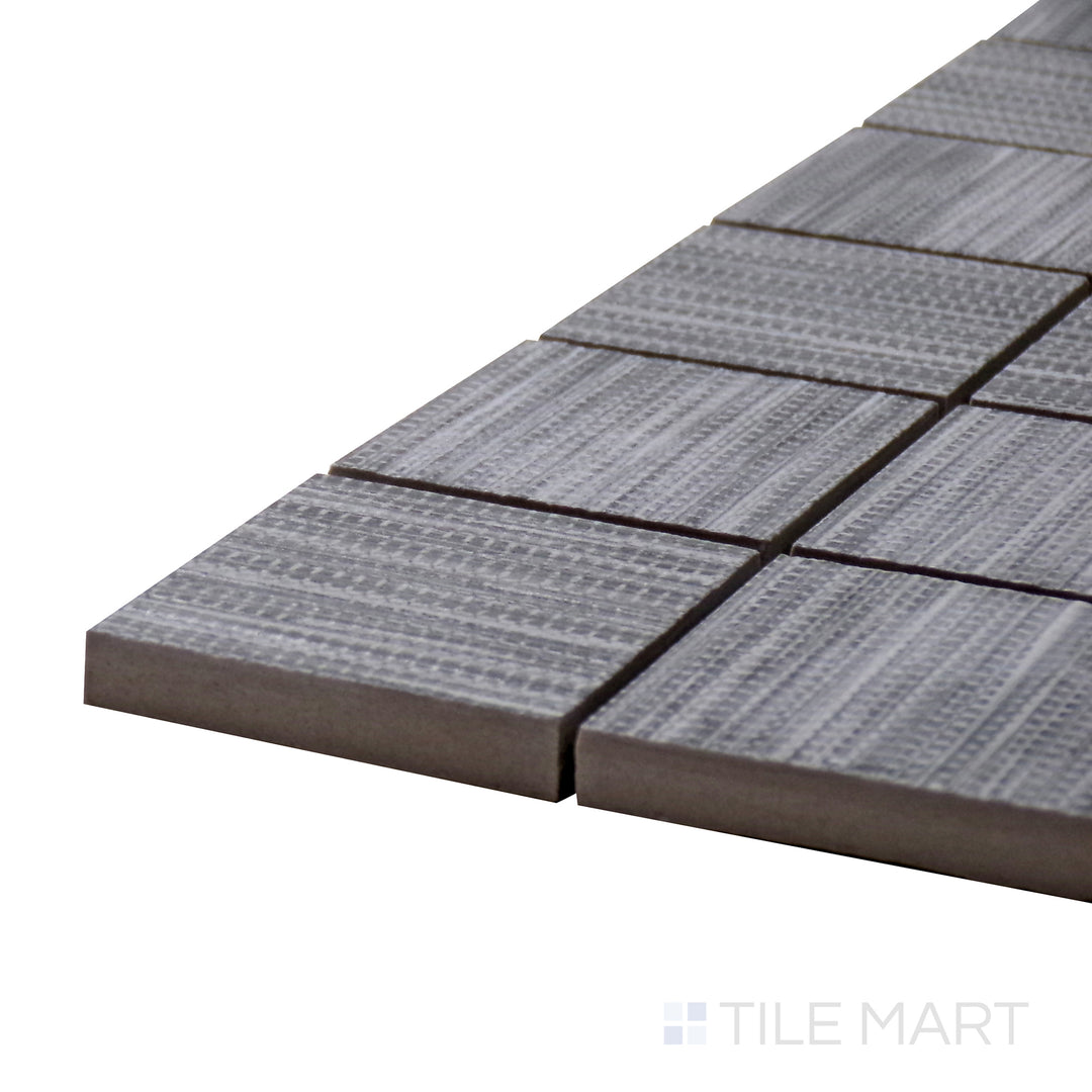 Side perspective of Wooow Linen Silver 2" Square Matte Porcelain Mosaic, capturing its elegant gray tones with a textured matte finish.