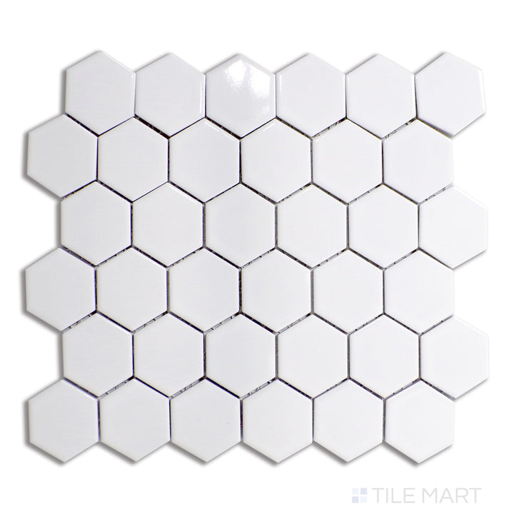 Overhead shot of Retro White 2" hexagon glossy porcelain mosaic, showcasing crisp white hexagonal tiles with a sleek glossy finish for a timeless, elegant look.