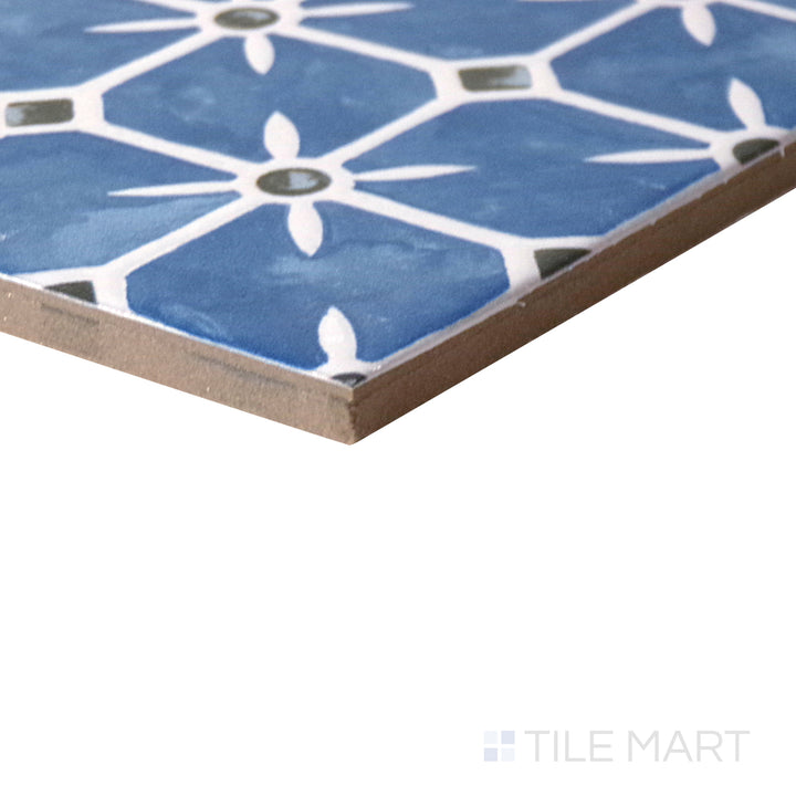 Angled shot of Caliope Marine 6x6 matte porcelain tile, featuring a rich marine blue tone, smooth matte finish, and structured square format.  