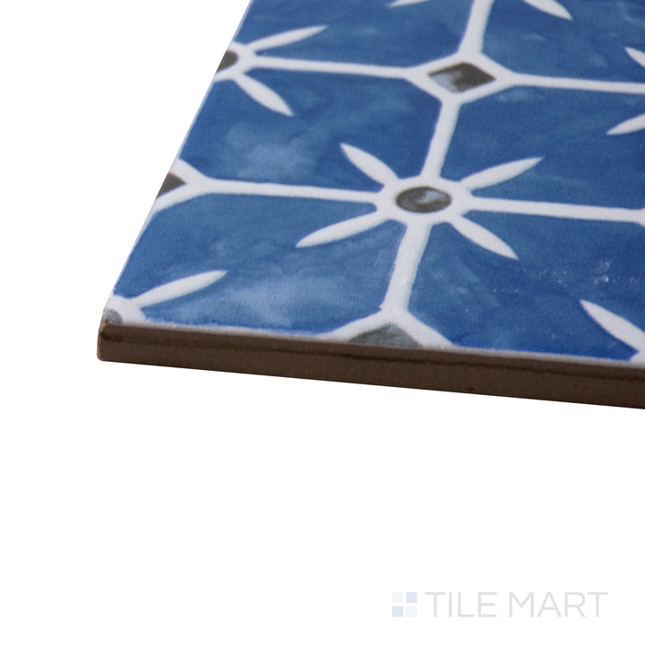 Corner shot of Caliope Marine 6X6 Matte Porcelain Tile, emphasizing its deep marine blue hues with a soft matte texture.