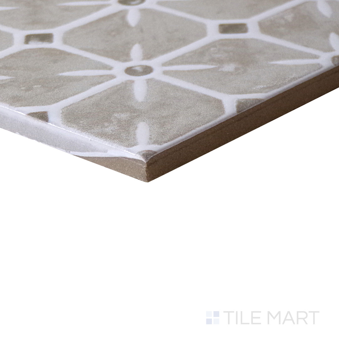 Slanted perspective of Caliope Sand 6x6 matte porcelain tile, emphasizing its warm sandy beige tones, smooth matte texture, and structured square design.  