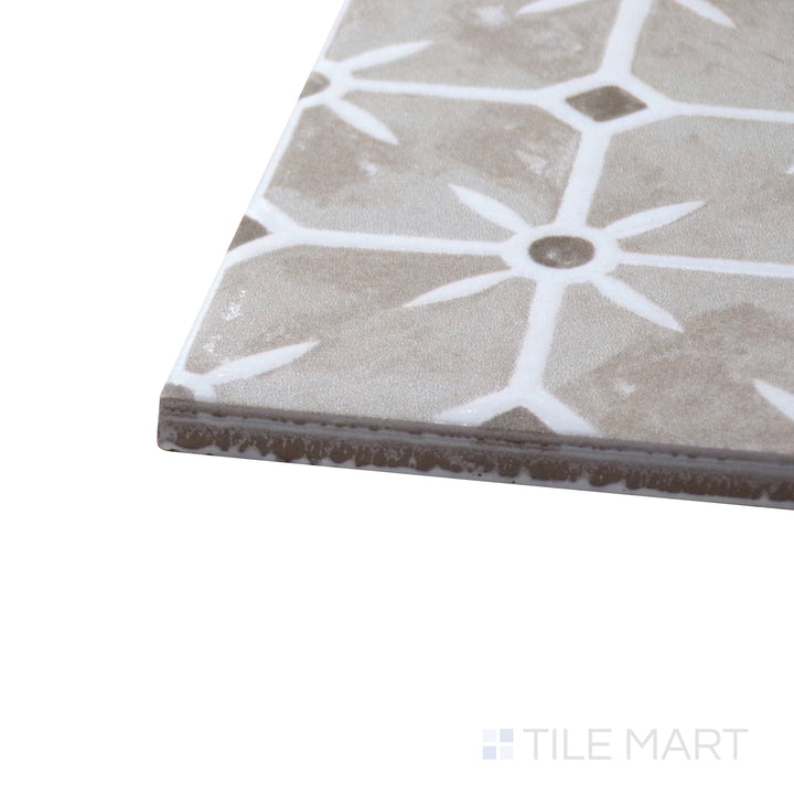 Close-up corner shot of Caliope Sand 6X6 Matte Porcelain Tile, featuring its warm sandy beige tones with a natural stone-inspired matte surface.