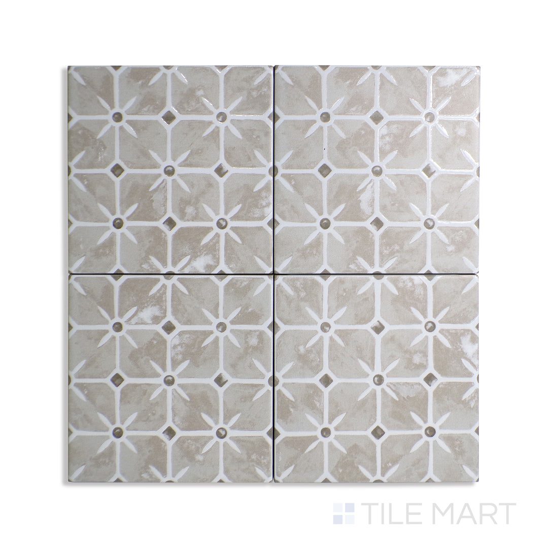 Overhead shot of Caliope Sand 6X6 matte porcelain tile, a warm sandy beige tile with a refined matte texture, ideal for creating a cozy, neutral backdrop.