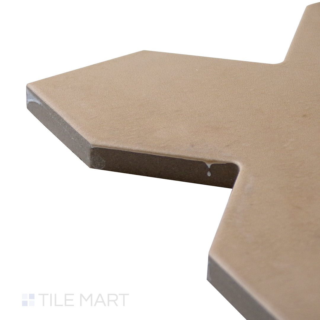 Angled view of Kasbah Cross Fawn 5X5 Matte Porcelain Tile, highlighting its warm beige hues with a classic cross design and a soft matte texture.
