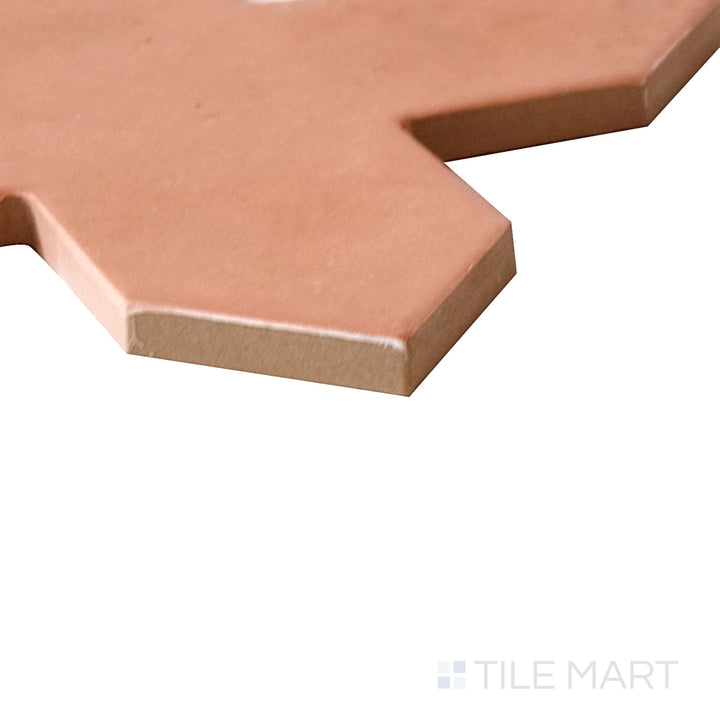 Diagonal view of Kasbah Cross Terracotta 5x5 matte porcelain tile, showcasing its earthy terracotta shade, rustic matte finish, and classic square shape.  