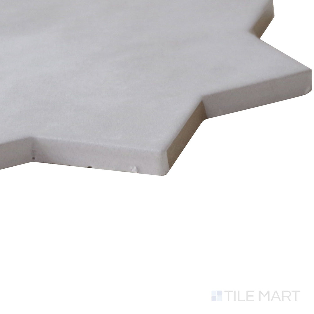 Side perspective of Kasbah Star Smoke 6.5X6.5 Matte Porcelain Tile, capturing its soft gray hues with an elegant star design in a matte finish.
