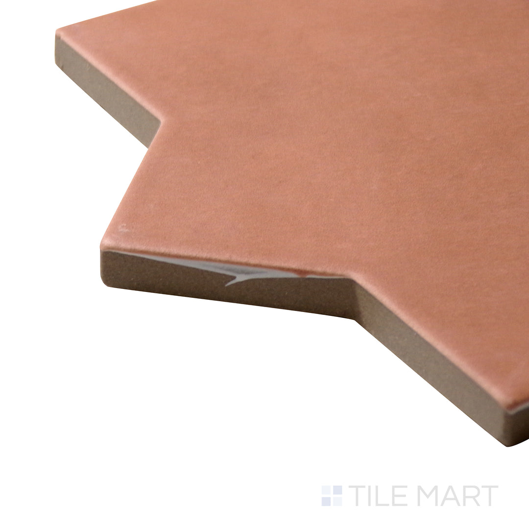 Corner-focused shot of Kasbah Star Terracotta 6.5X6.5 Matte Porcelain Tile, highlighting its deep terracotta hues with an intricate star design.