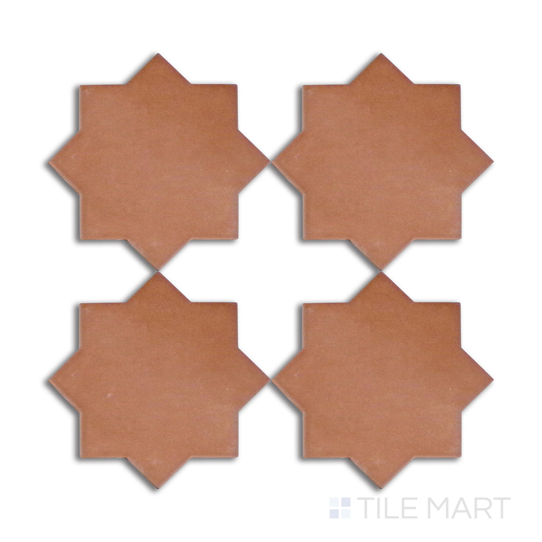 Overhead shot of Kasbah Star Terracotta 6.5X6.5 matte porcelain tile, a striking blend of deep terracotta with an intricate star motif for a bold decorative statement.