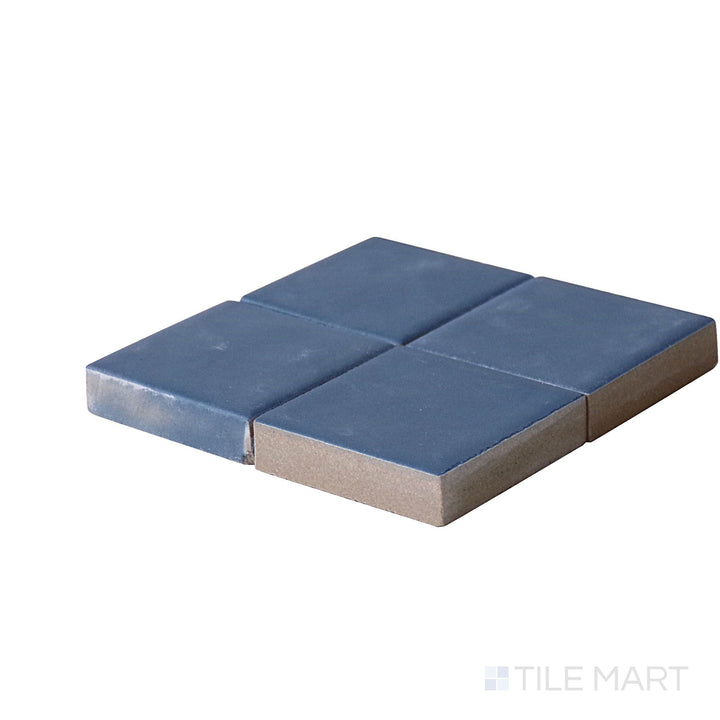 Side perspective of Kasbah Taco Blue Night 1X1 Matte Porcelain Tile, capturing its deep blue hues with a velvety matte surface.
